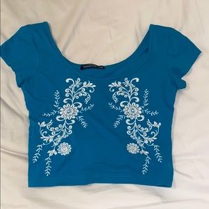 Blue shirt with white detailing